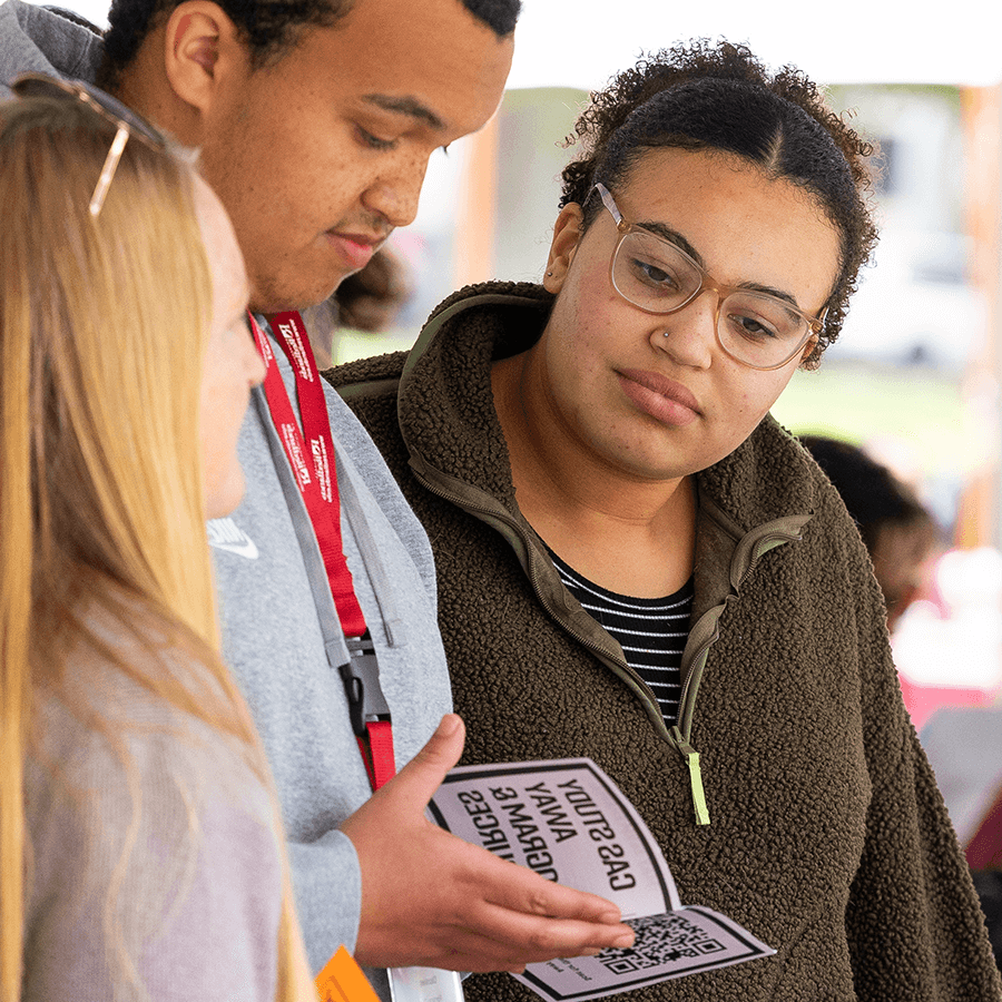 Image Carousel - prospective students viewing brochure